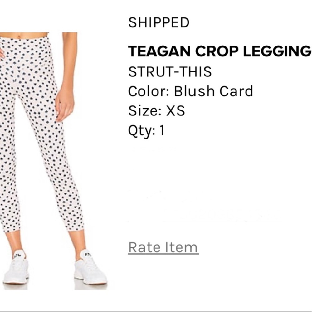 “Strut this” brand leggings. Pale pink with card print